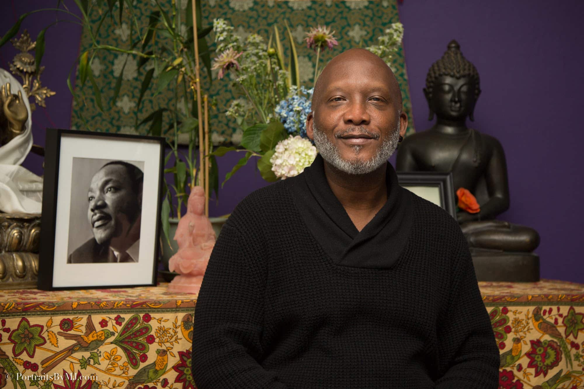 meditation leader devin berry sits calmly